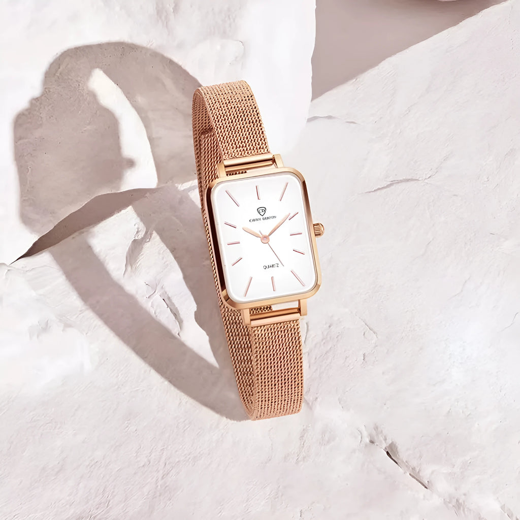 Women's waterproof quartz watch with woven steel band and alloy case in rose gold or silver
