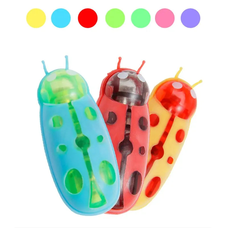 Electric bug cat toy with ladybug design showing angular legs and compact 4.5cm size