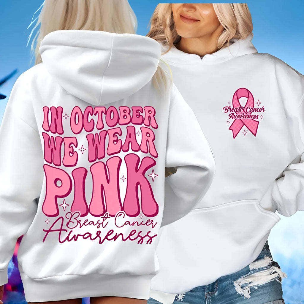 Breast cancer awareness pullover hoodie in pink with retro art design and a side seam pocket.