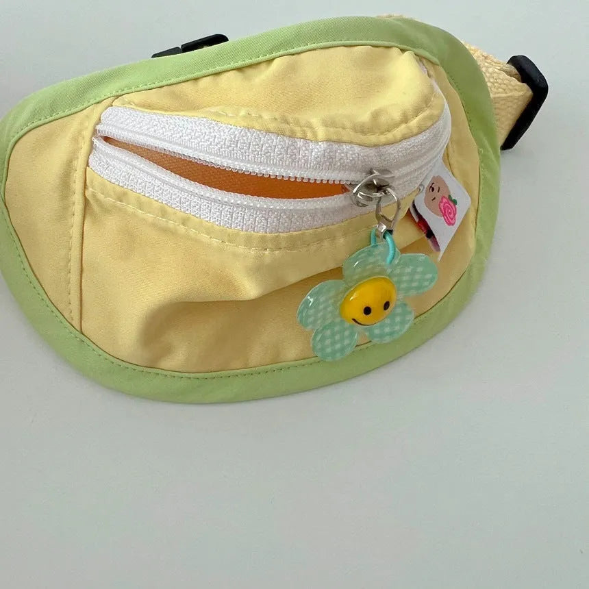 Powder blue backpack-style pet carrier for small dogs or cats, showing mesh panels and adjustable straps.