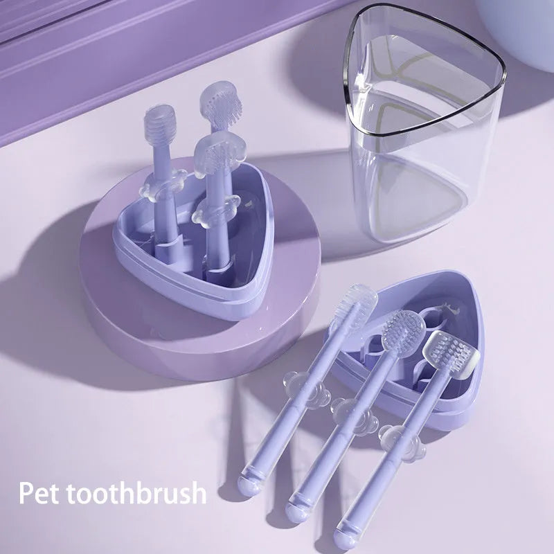 Purple pet toothbrush with flexible silicone head for cleaning cat and dog teeth