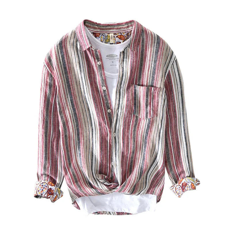 Grey striped linen shirt with long sleeves on male model showing loose casual fit