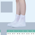 Women's white PVC high top water resistant shoe covers with anti-skid sole