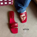 Plus size outdoor slippers with square toe design in red, white, black, and silver colour options on a plain background