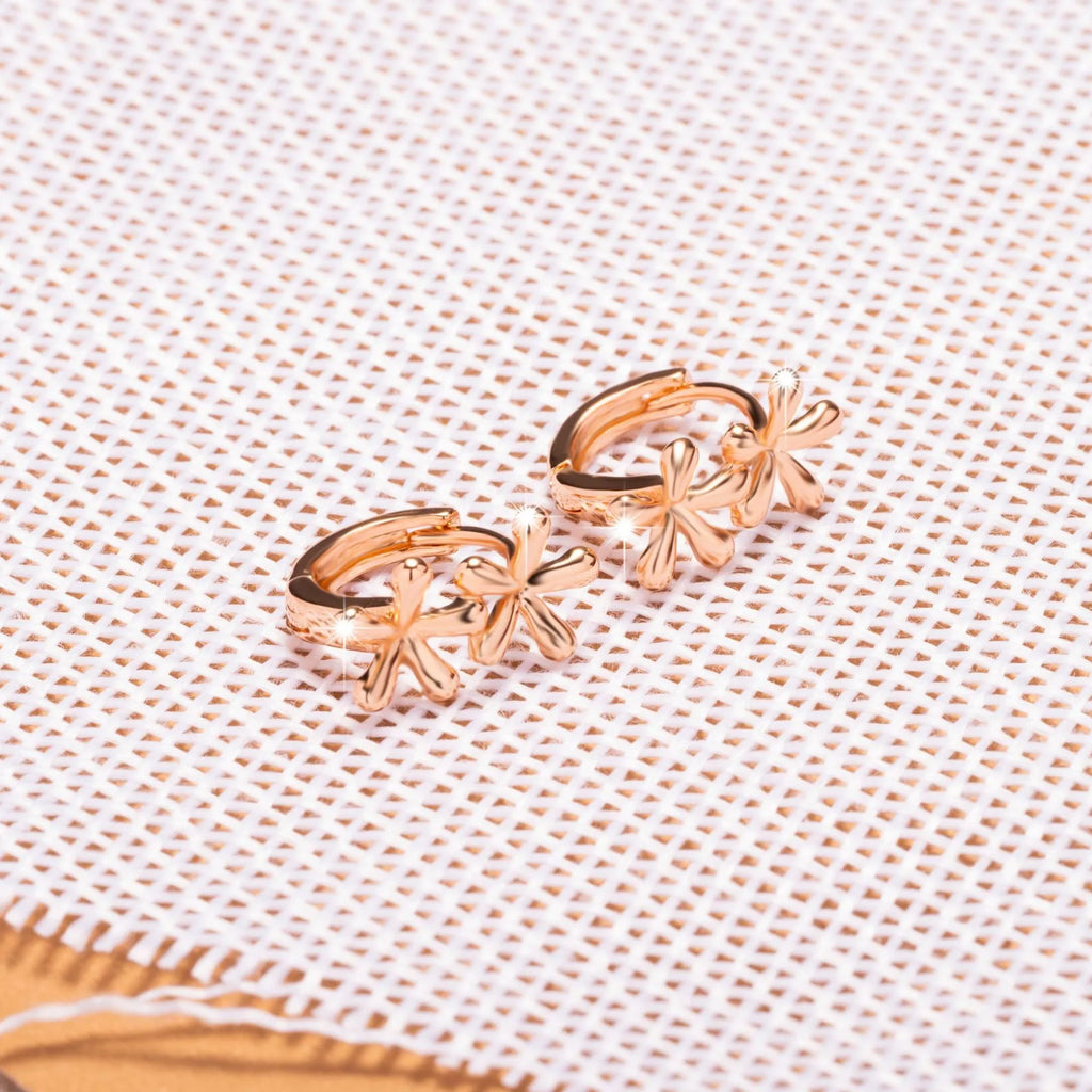 Rose gold circular earrings with waterdrop flower design and electroplated finish