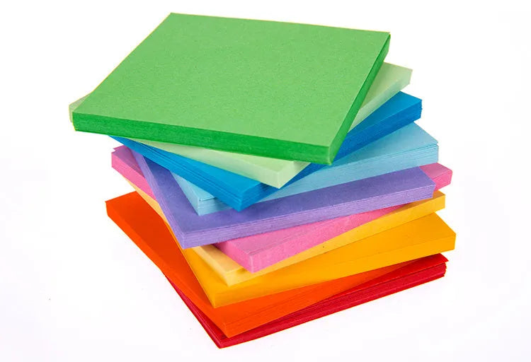 Assorted colour mini paper scrolls with eyelets for drift bottle messages and crafts.