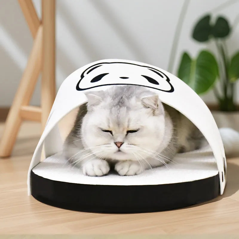 White slipper-style corrugated paper cat scratch board lying flat.