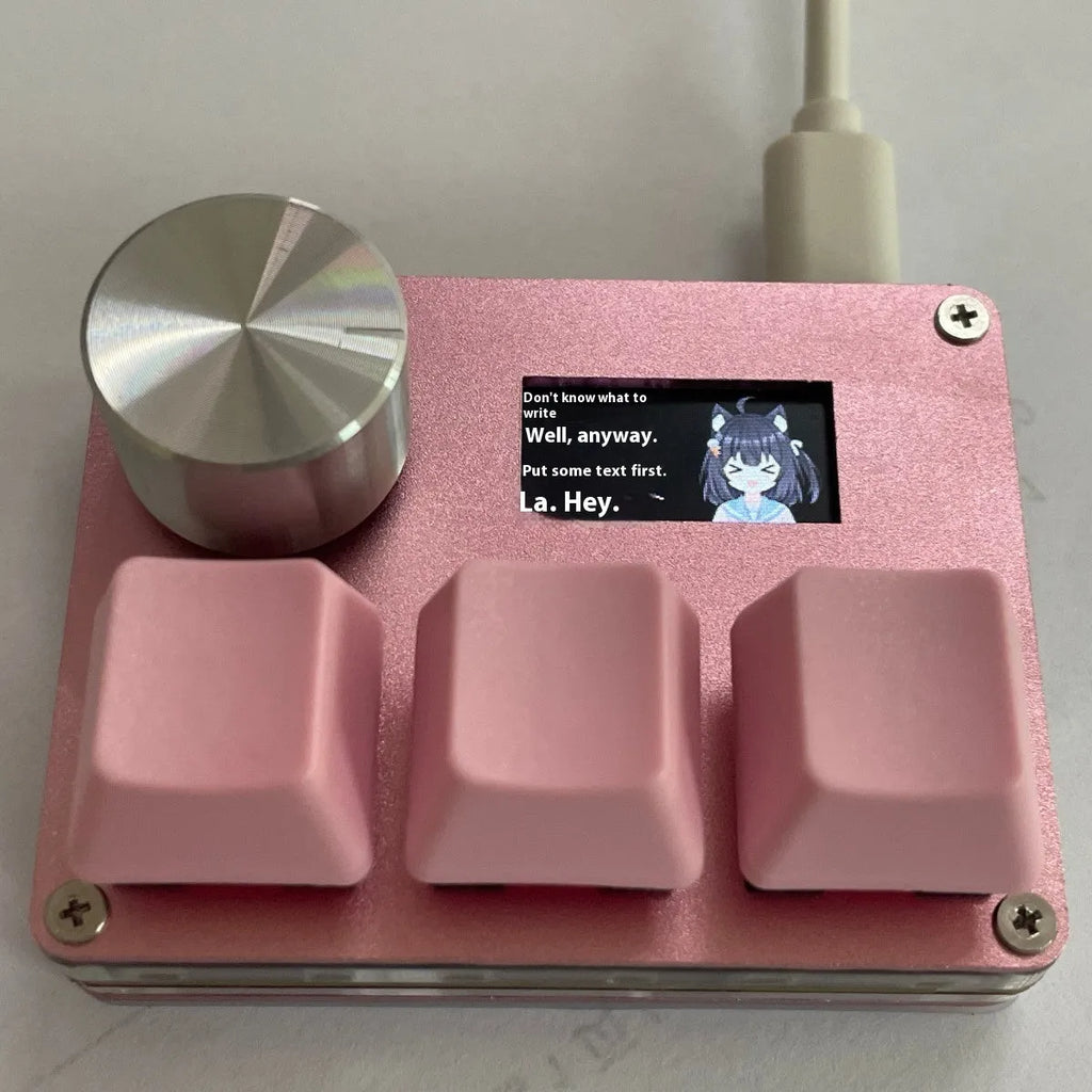 Magnetic axis Hall effect numeric game keyboard with colour screen and programmable knob in black, pink, silver or white.