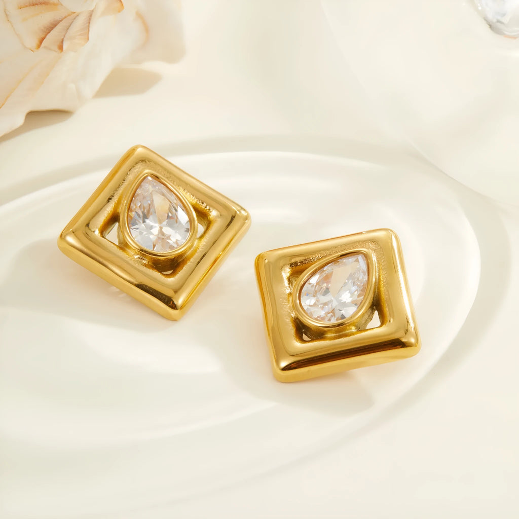 Gold electroplated stainless steel stud earrings with geometric water drop zircon inlay