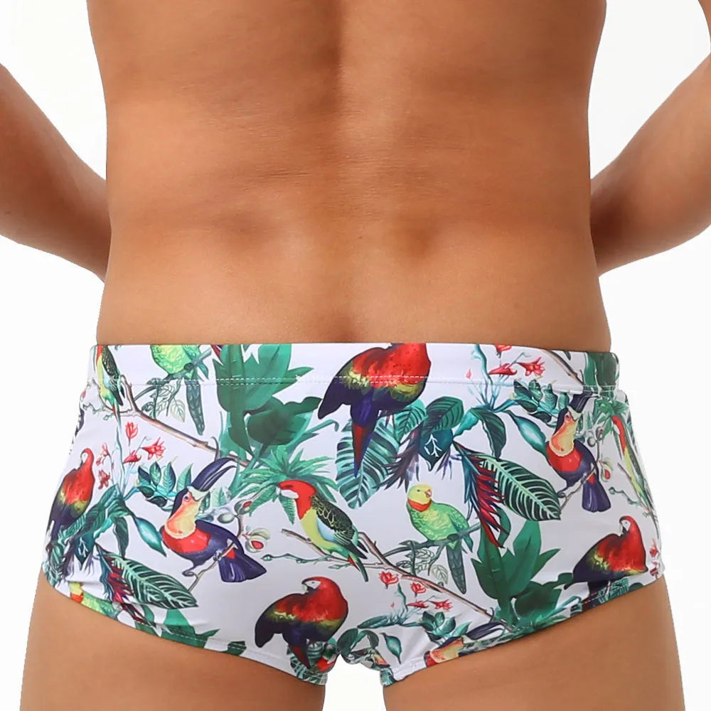 Men's swimming trunks with flower and bird print design in nylon fabric for beach and pool swimming