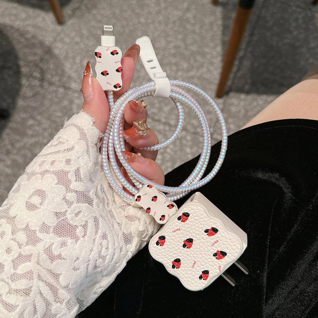 Set of four lambskin USB cable protection sleeves with cartoon puppy designs for 18W 20W chargers