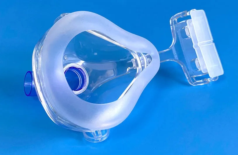 Transparent silicone CPAP breathing mask with headgear and two adapter elbows for ventilator connection