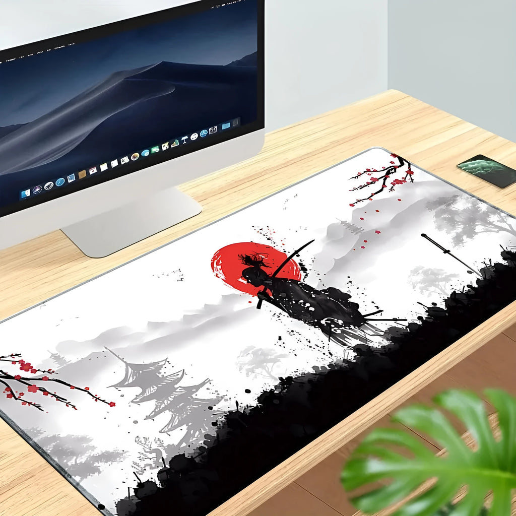 Japanese samurai design cloth gaming mouse pad on a desk, showing non-slip base and multiple size options.