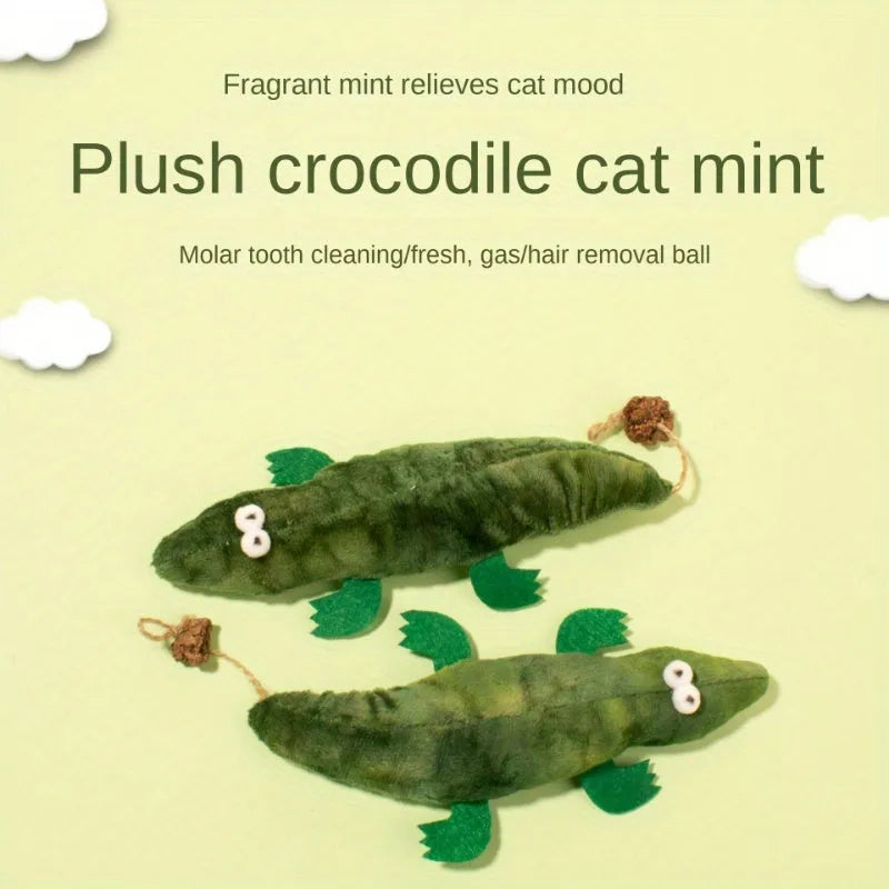 Green plush alligator cat toy measuring 28cm long with textured surface for feline play