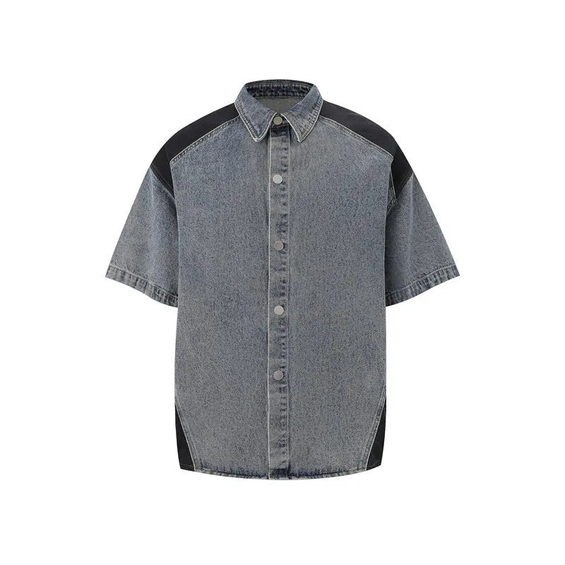 Retro washed denim jeans suit featuring a short-sleeved jacket and matching trousers in a blue colour set.