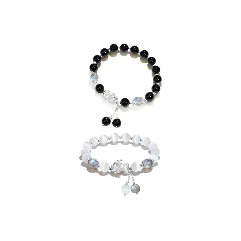 Natural black agate and gray opal couple bracelet with 10mm wave-shaped beads.