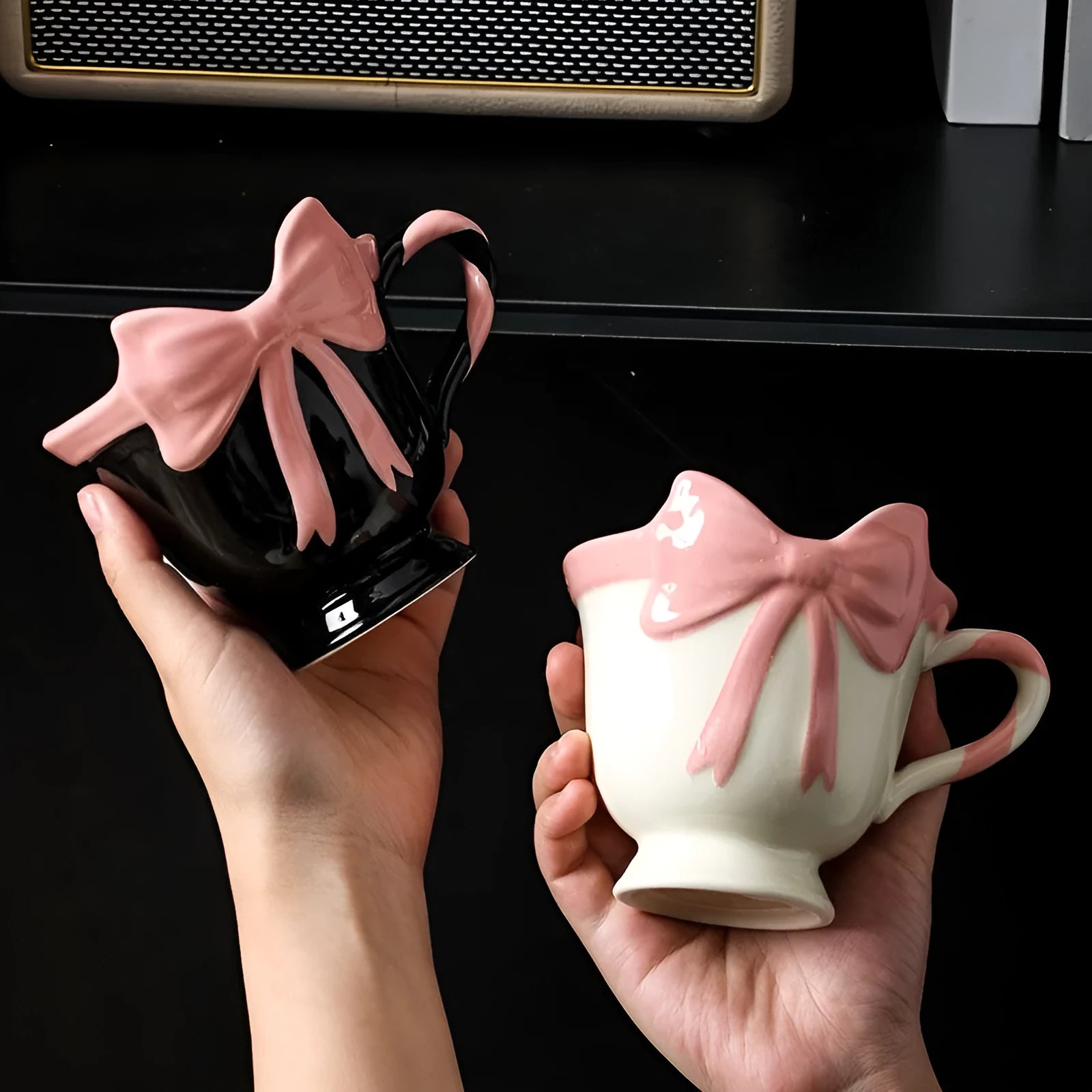 Ceramic mug with heart bow design in black pink or white powder colour, 301-400ml capacity