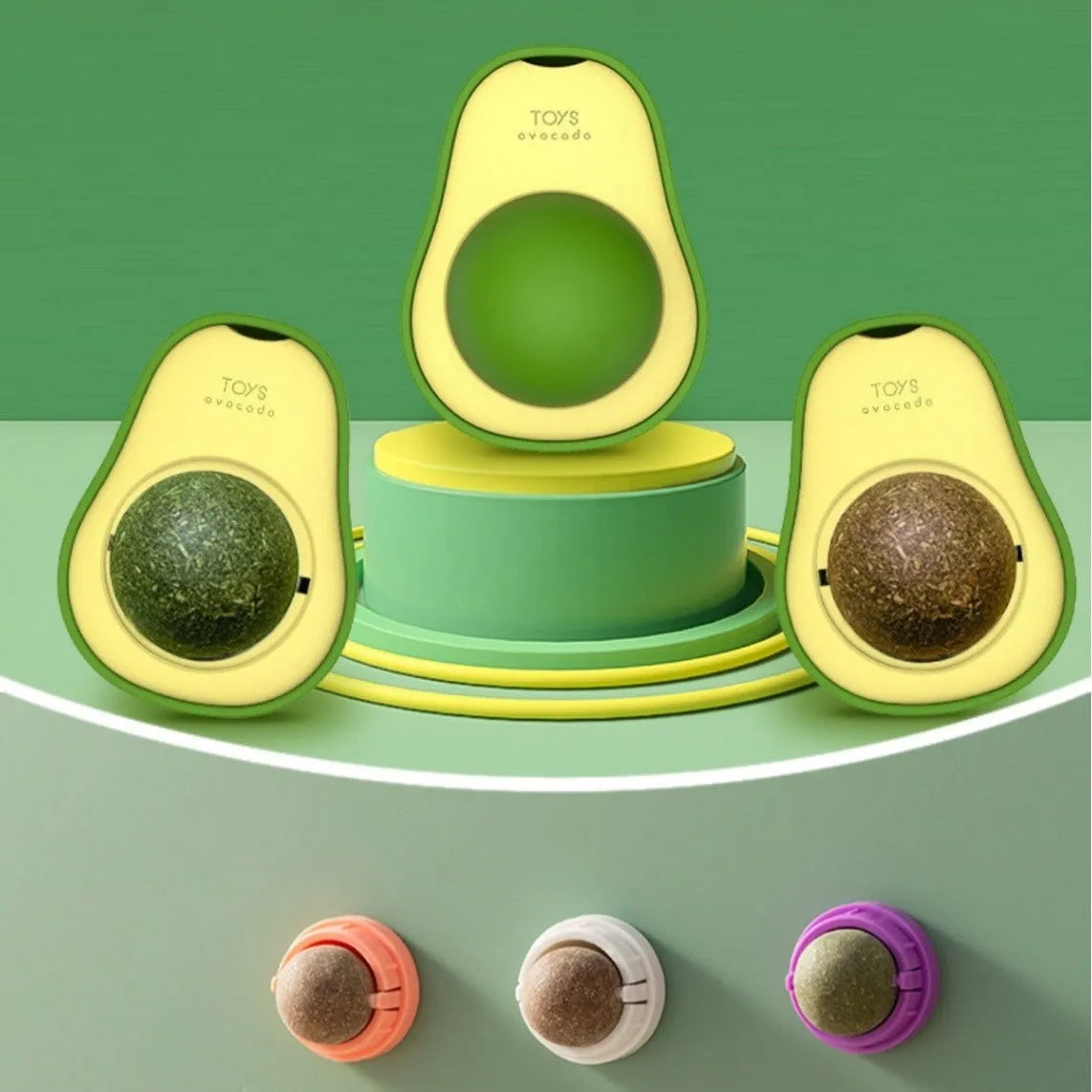 A plastic catnip chew ball toy for dental cleaning, shown in assorted colours including pink, blue, and green.