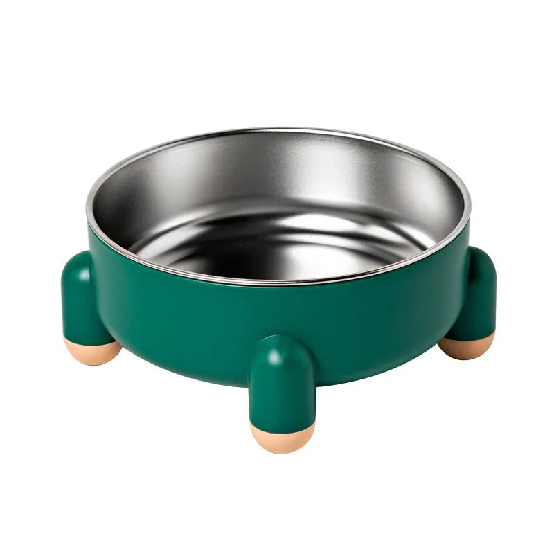 Green stainless steel pet bowl with high foot and non-slip base on a floor