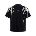 Black loose fit short sleeve T-shirt with rivet ribbon padded shoulder detail
