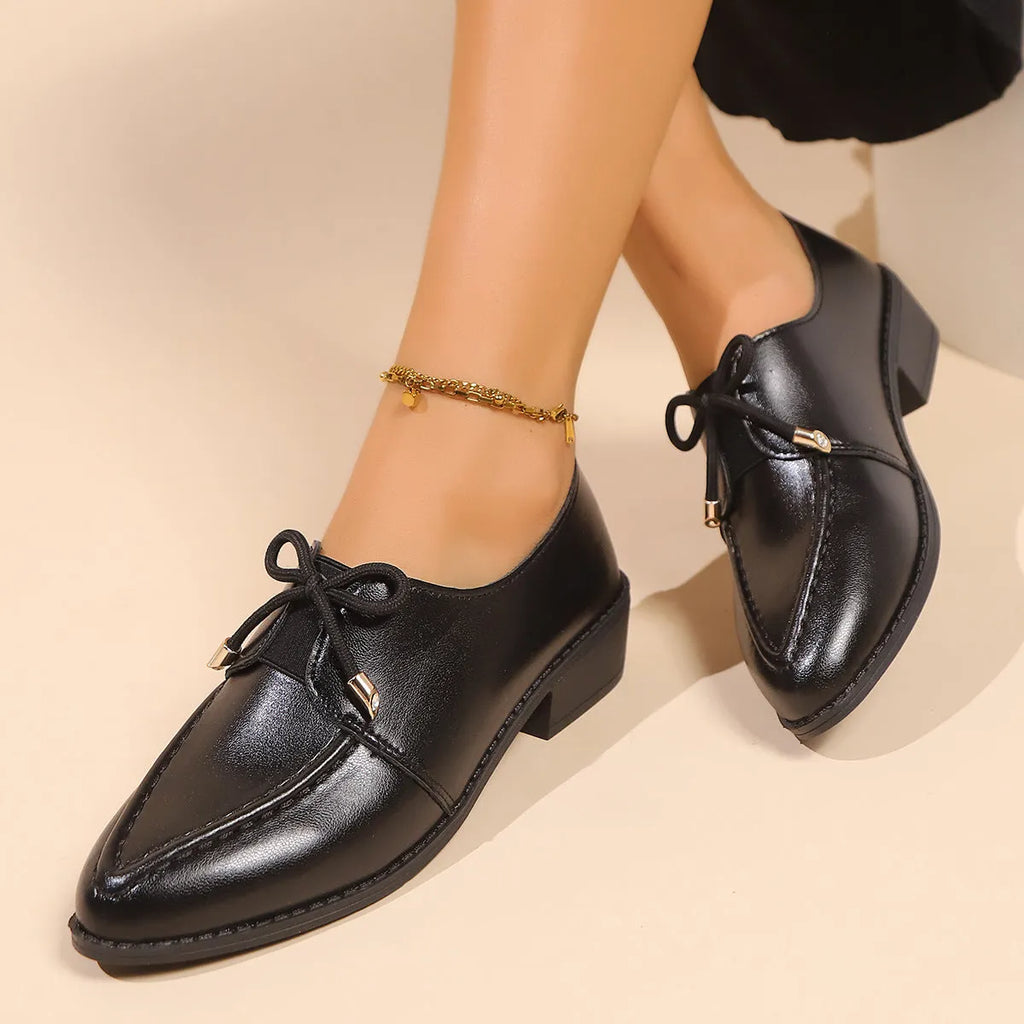 Women's British-style leather shoes with decorative bow detail and pointed toe in multiple colour options
