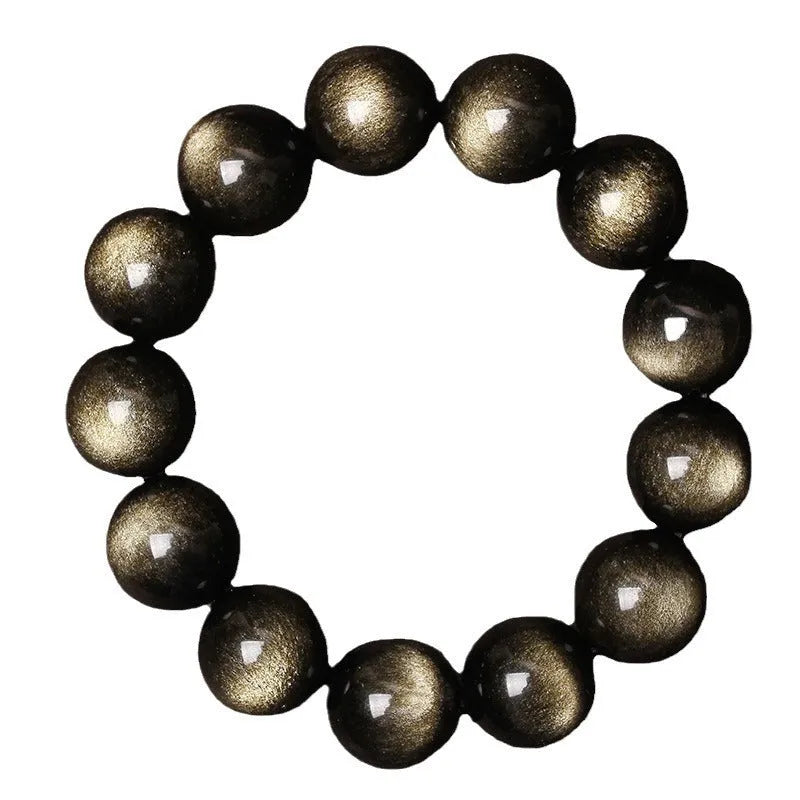 Adjustable sliding knot obsidian bracelet in hand with choice of black, rainbow eye, and silver crystal beads