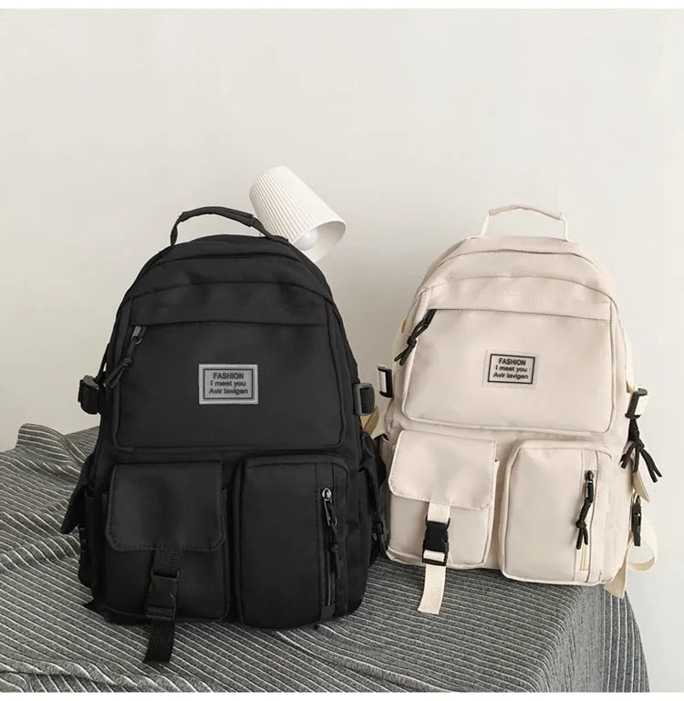 Nylon student backpack with computer compartment in black and white colour options