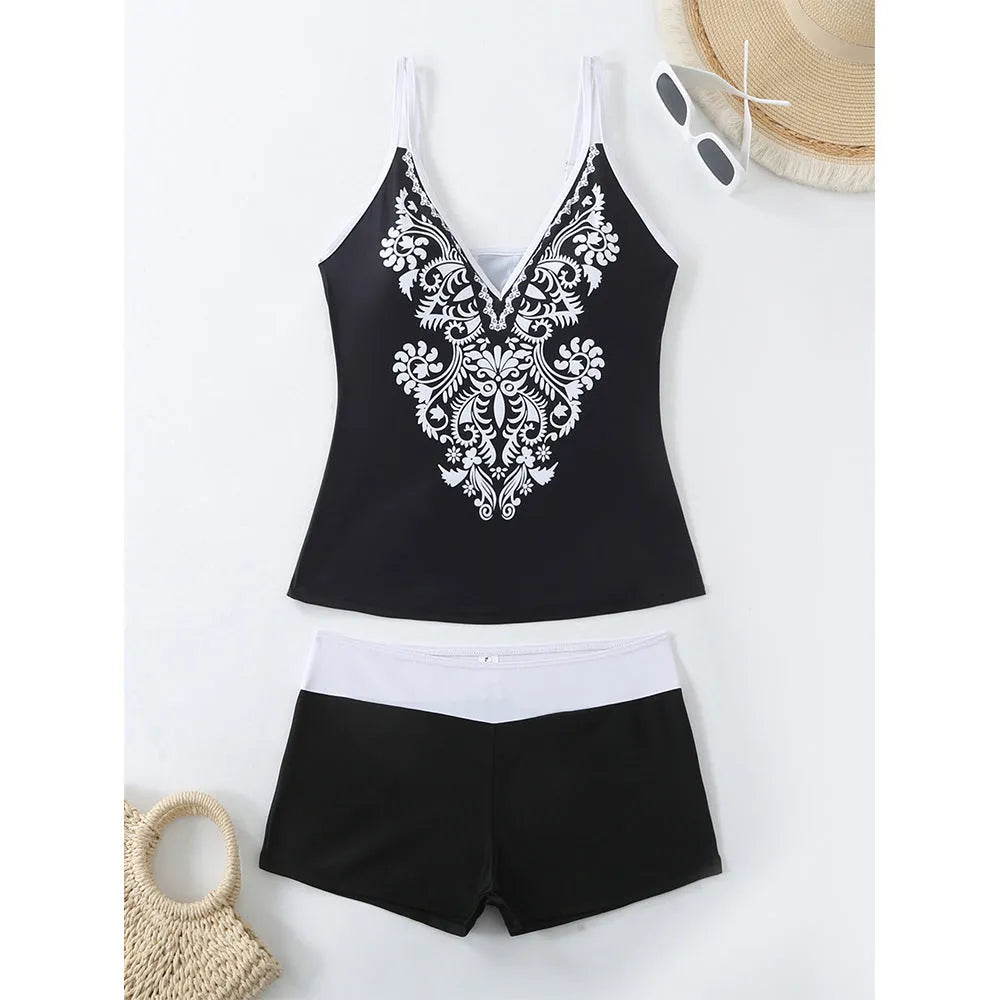 Plus size women's swimsuit with matching briefs in black or rose red print styles