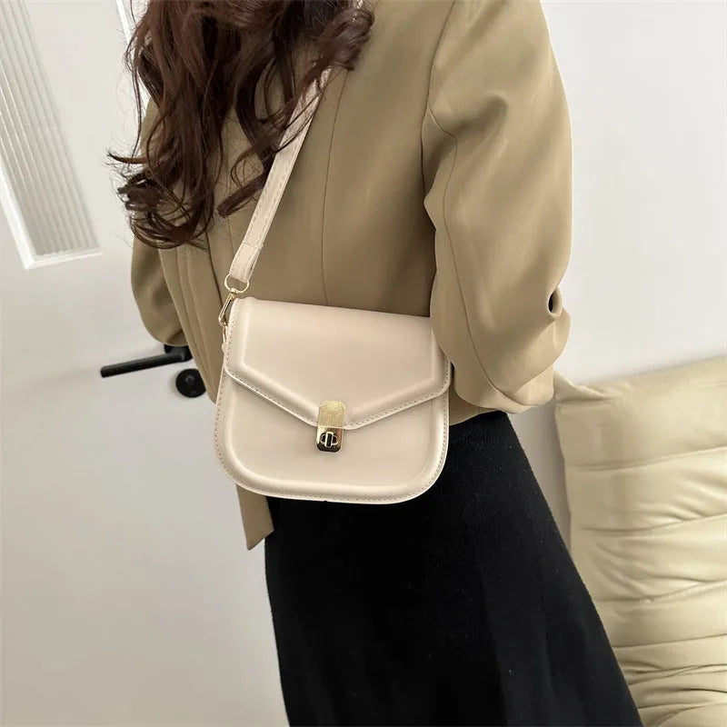 Soft PU shoulder messenger bag with clamshell opening in horizontal square shape