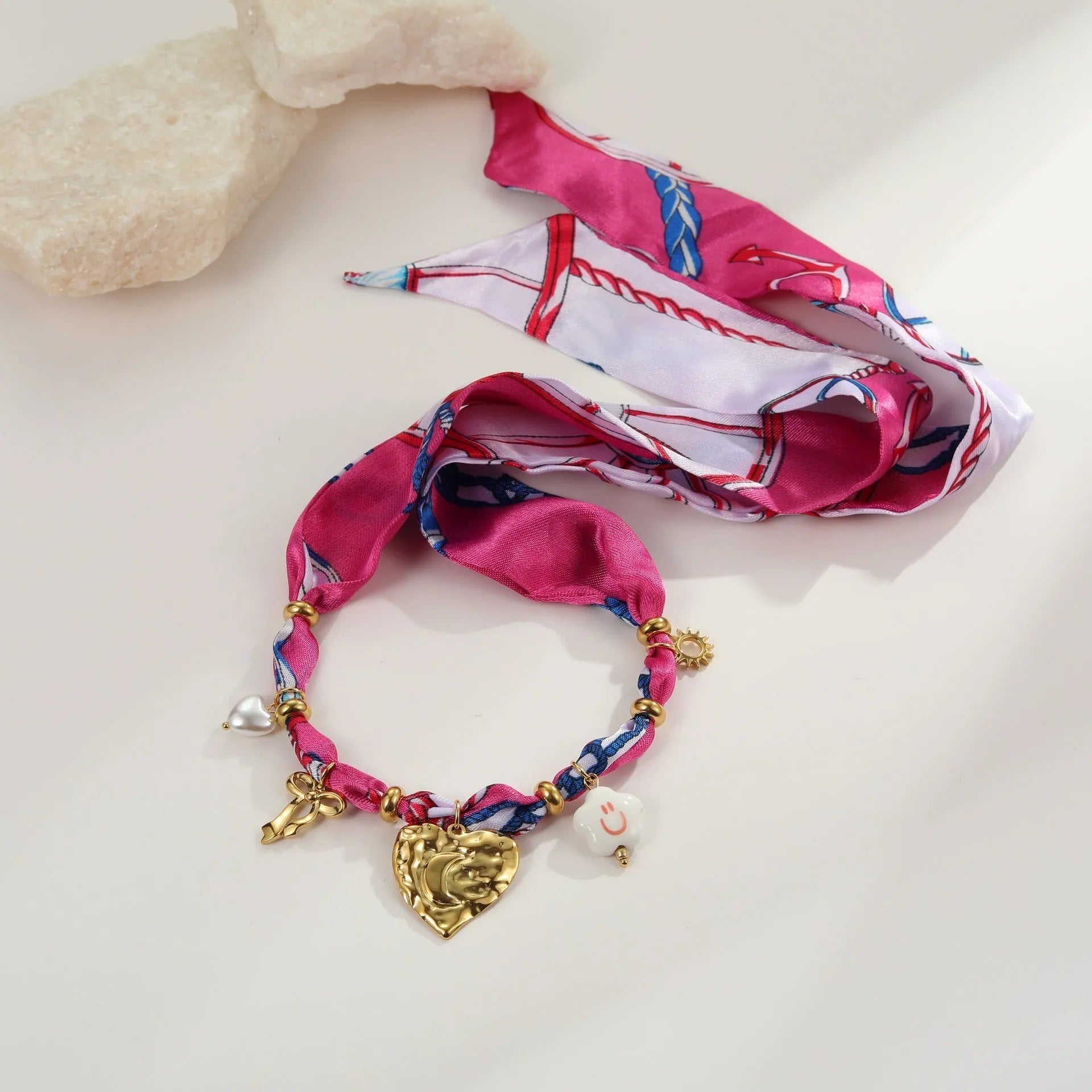 Geometric love pendant necklace and bracelet set in stainless steel with electroplated finish