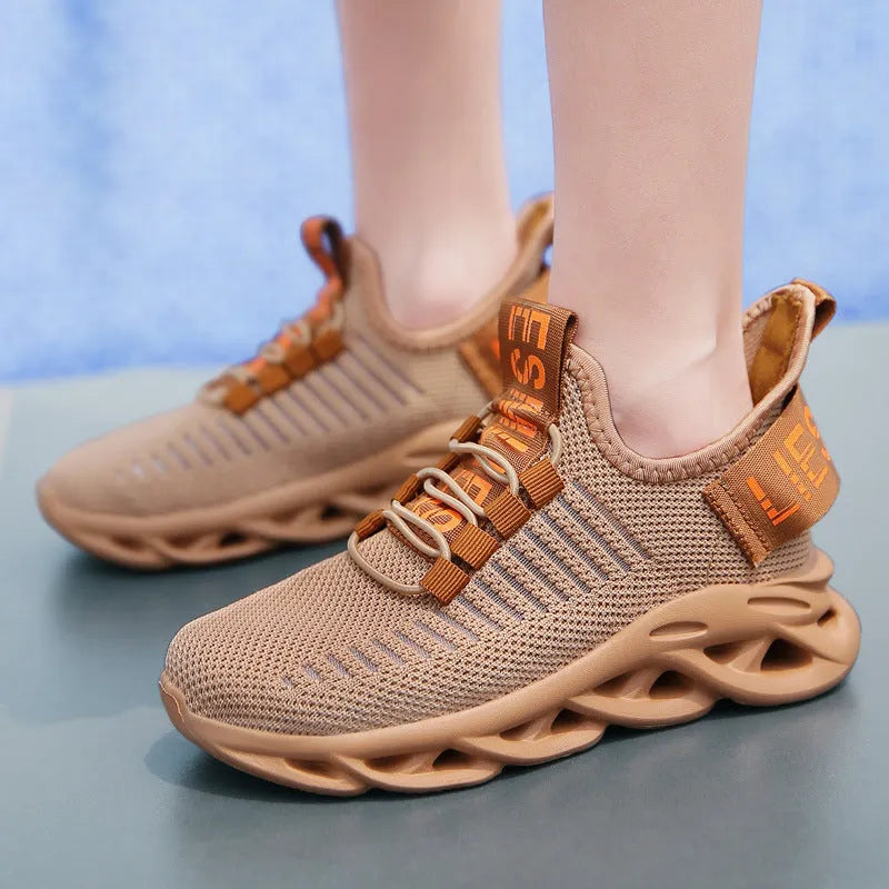 Kids coconut sneakers with Velcro fastening in black, khaki, or white colours with fabric upper and EVA sole