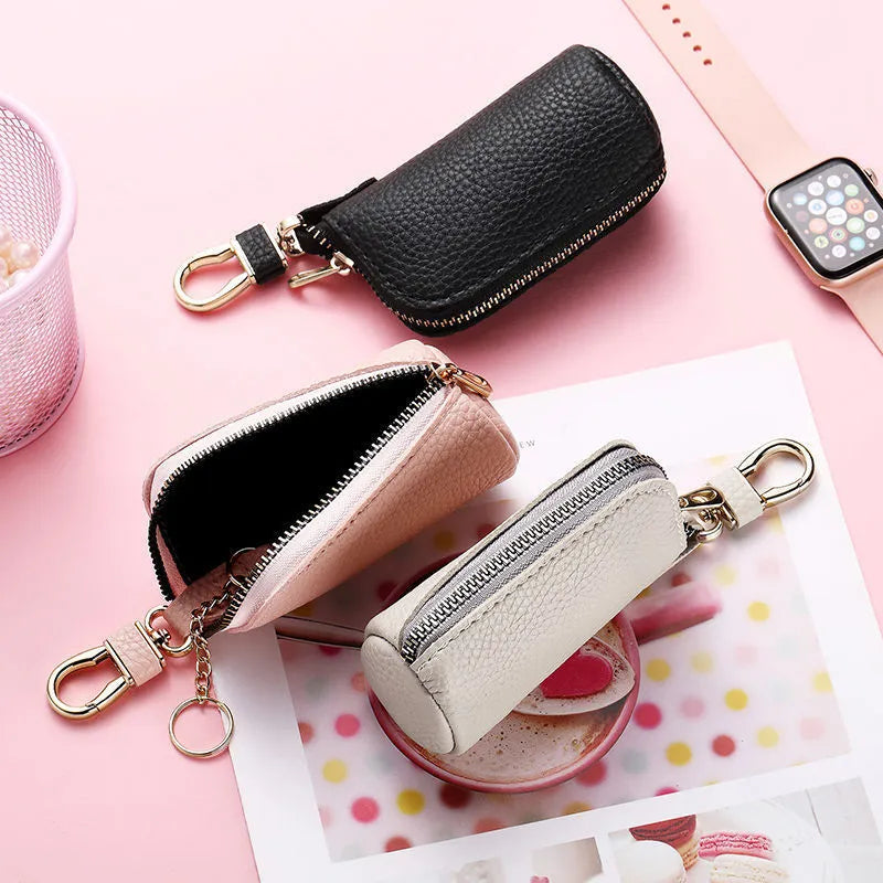 Men's simple PU key case with zipper closure in black, grey, and pink colour options