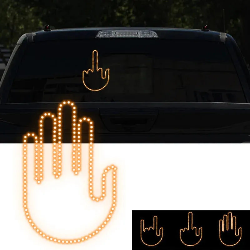 Black plastic LED gesture car light with remote control showing illuminated hand symbol.