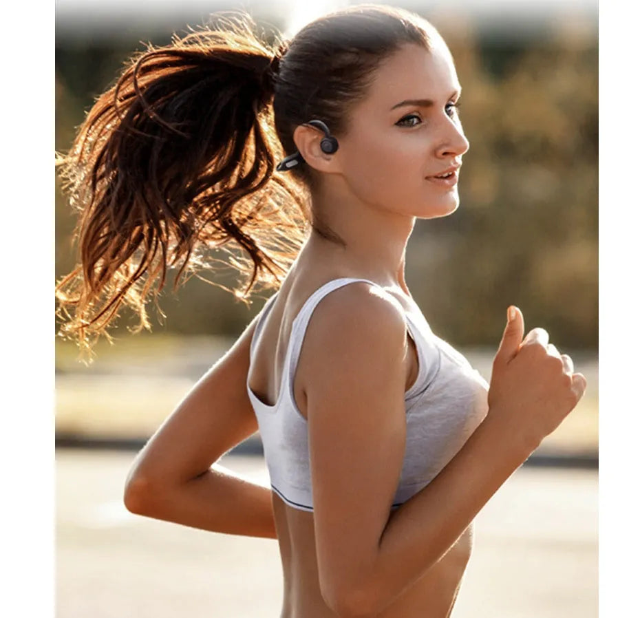Bone conduction Bluetooth headset in Grey or Pink with Bluetooth 5.0, 140 mAh battery, 8-hour call time, and optional 8G memory