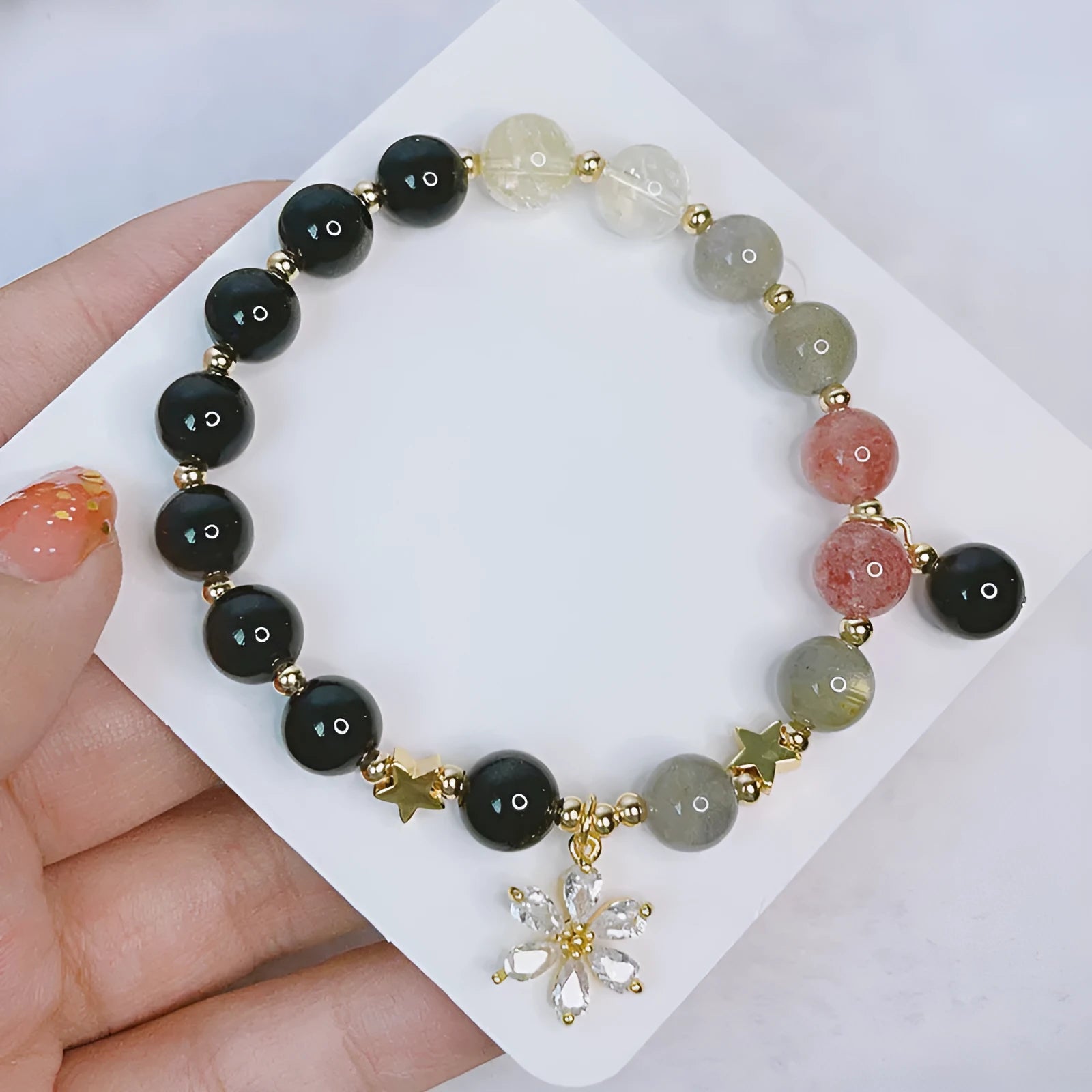 Women's electroplated silverstone bracelet in sweet cool style showing flowers, love and star pattern options
