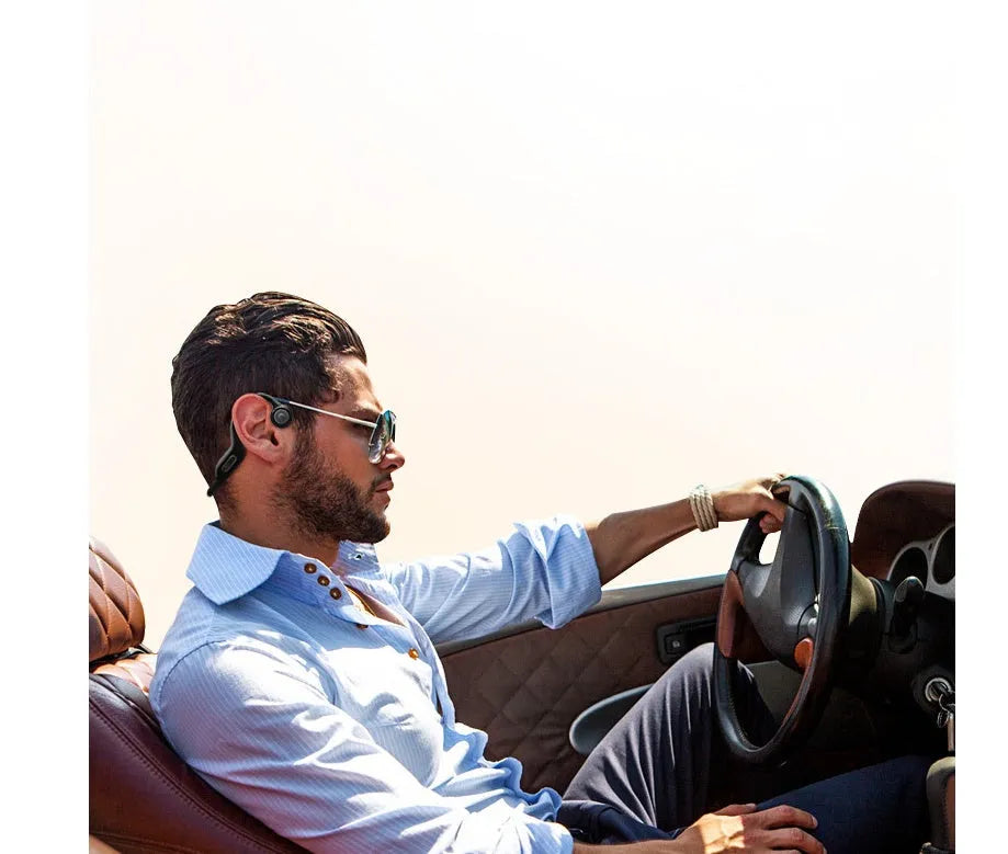 Bone conduction Bluetooth headset in Grey or Pink with Bluetooth 5.0, 140 mAh battery, 8-hour call time, and optional 8G memory
