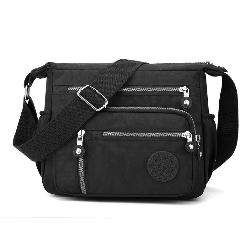 Nylon messenger bag with single shoulder strap in square vertical shape