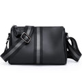 Black genuine leather one-shoulder crossbody bag showing front view and strap.