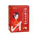 Box of ginger and jujube herbal tea with brown sugar, red dates, and wolfberries