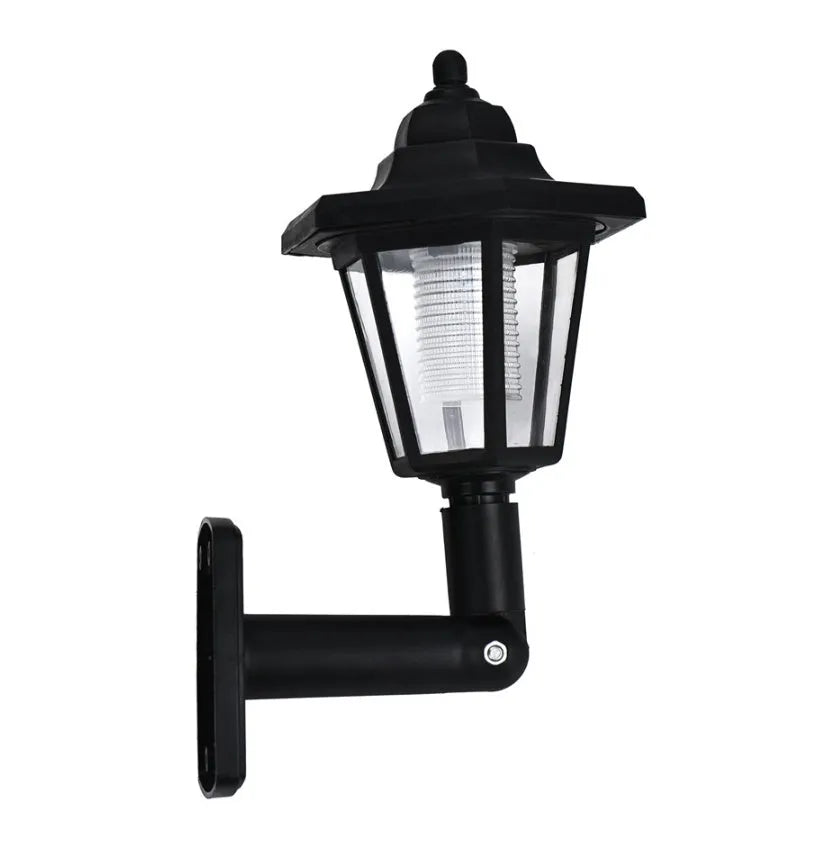 Black hexagonal solar-powered outdoor wall lamp with LED light.