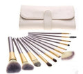 Persian makeup brush set with white bristles and champagne handles in 12, 18, or 24 piece options