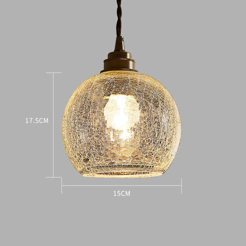 Retro brass chandelier with glass ball shade measuring 17.5cm wide by 15cm high