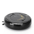 Blue round robot vacuum cleaner on a wooden floor next to its charging cable.