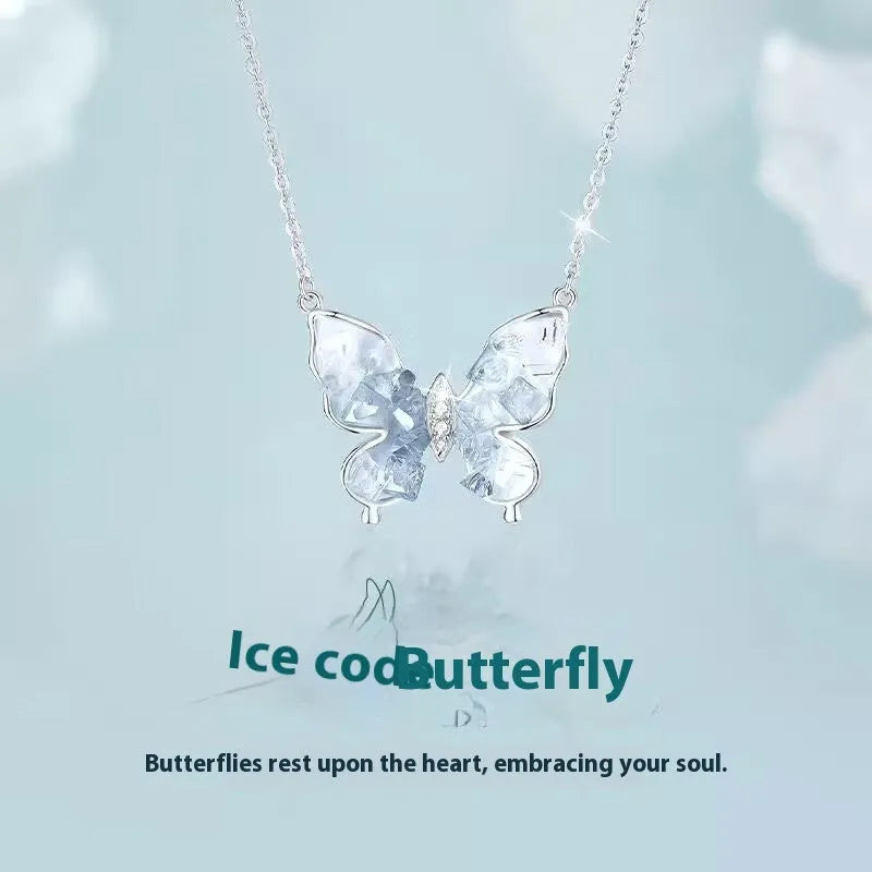 S925 silver necklace with detailed butterfly pendant and O-ring chain on display