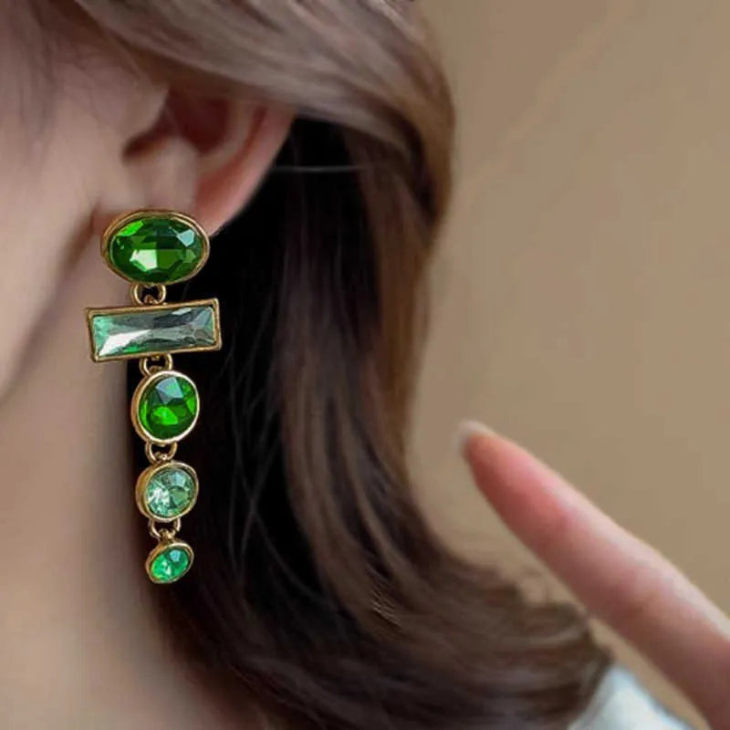 A pair of green gradient geometric Chinese style alloy earrings with inlaid zircon stones.