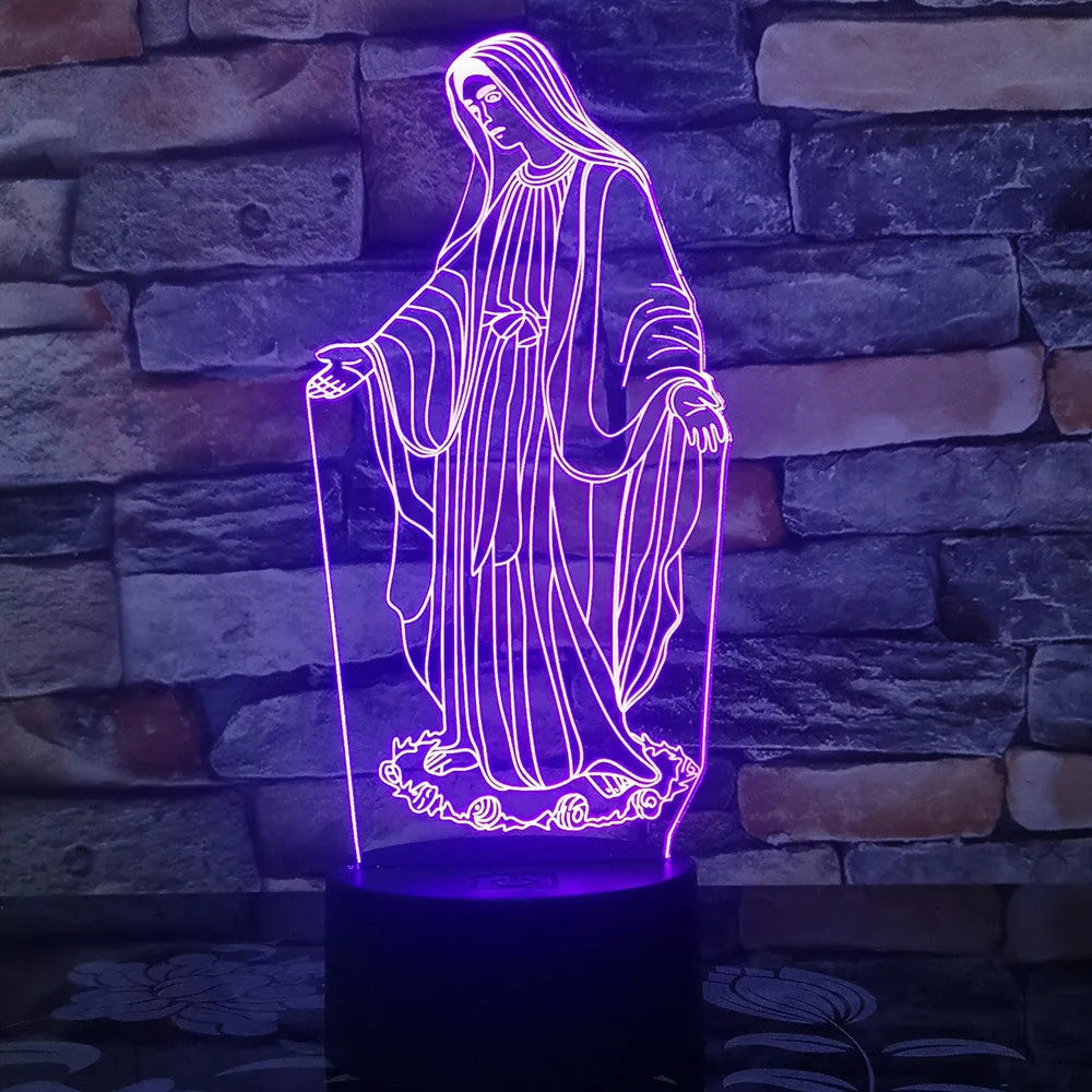 3D LED night light showing colourful dual ring pattern on acrylic panel, with remote control on desk.