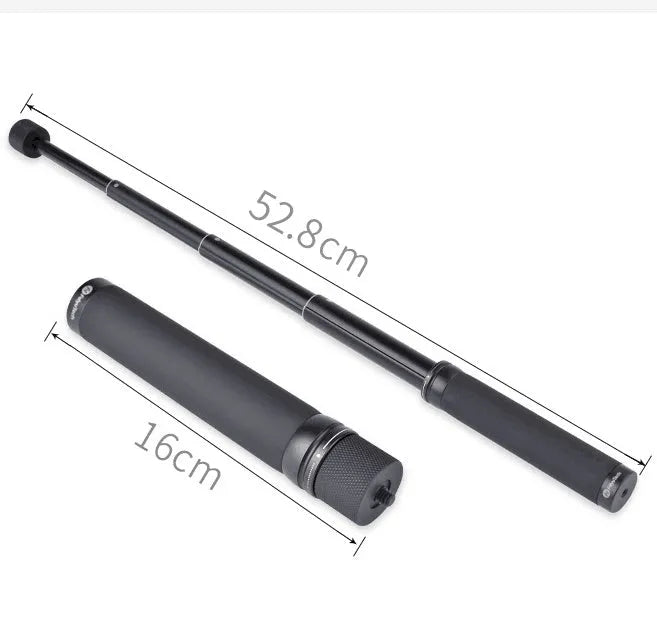 Black retractable selfie stick extended, showing smartphone mounted for a handheld shot.