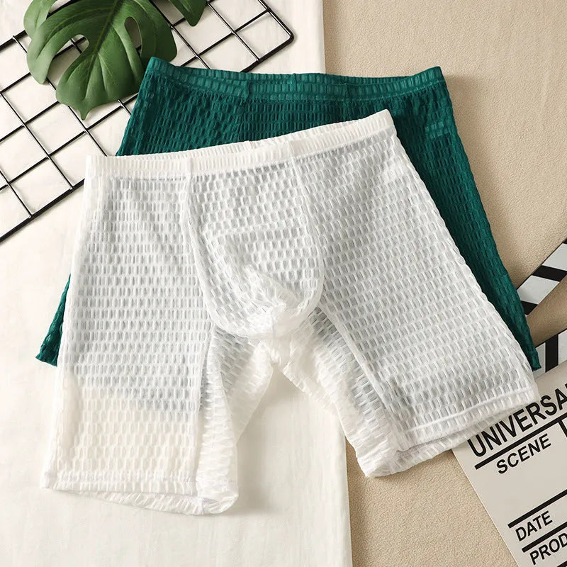 Men's solid colour lace boxer shorts in a lengthened, hip-lifting design on a white background.