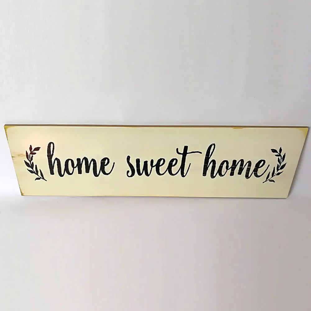 Carved wooden wall hanging ornament in black or white measuring 40cm long for home decoration