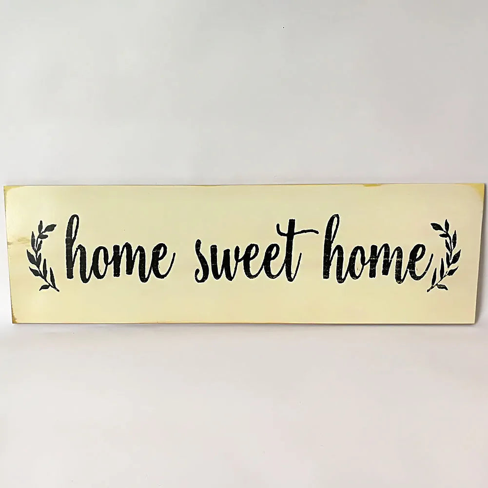Carved wooden wall hanging ornament in black or white measuring 40cm long for home decoration